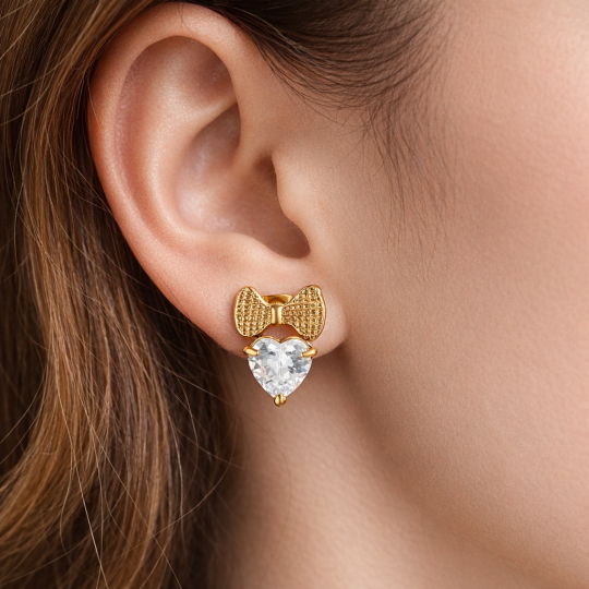 Boucles d'oreilles Nœud & Cœur Acier Doré