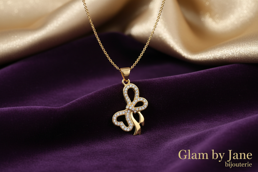 Collier pour femme chaîne ornée d'un joli pendentif nœud serti de zirconiums